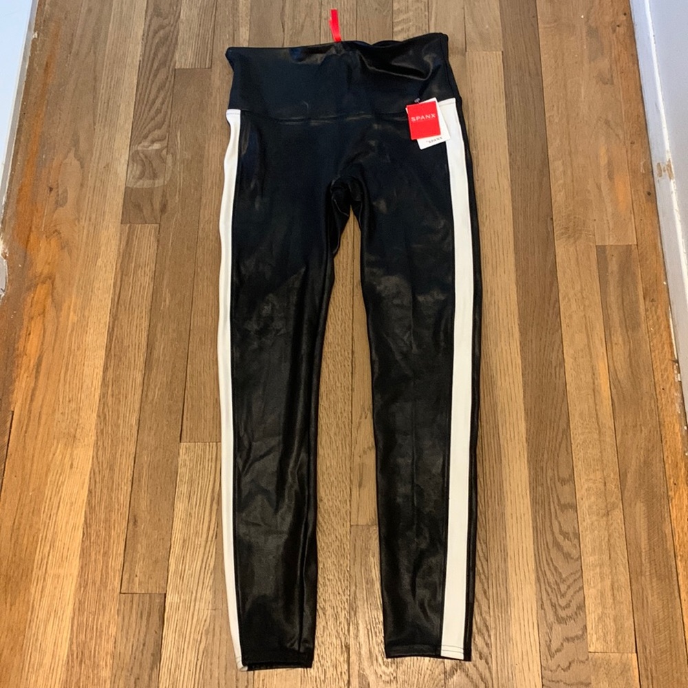 Size large faux leather Spanx with racing stripes